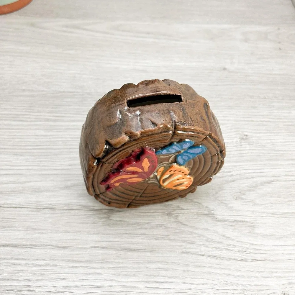 Vintage Ceramic Butterfly Piggy Bank: Kitschy Wood Log Decor